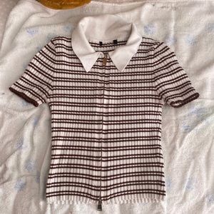 I am selling this brown and white plaid cropped shirt!